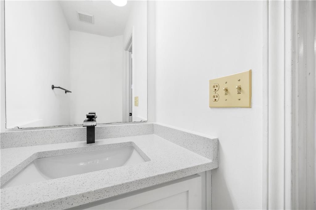 2883 Dresden Square Drive Atlanta, GA 30341 - Photo 12 of 30 a bathroom with a sink and a vanity