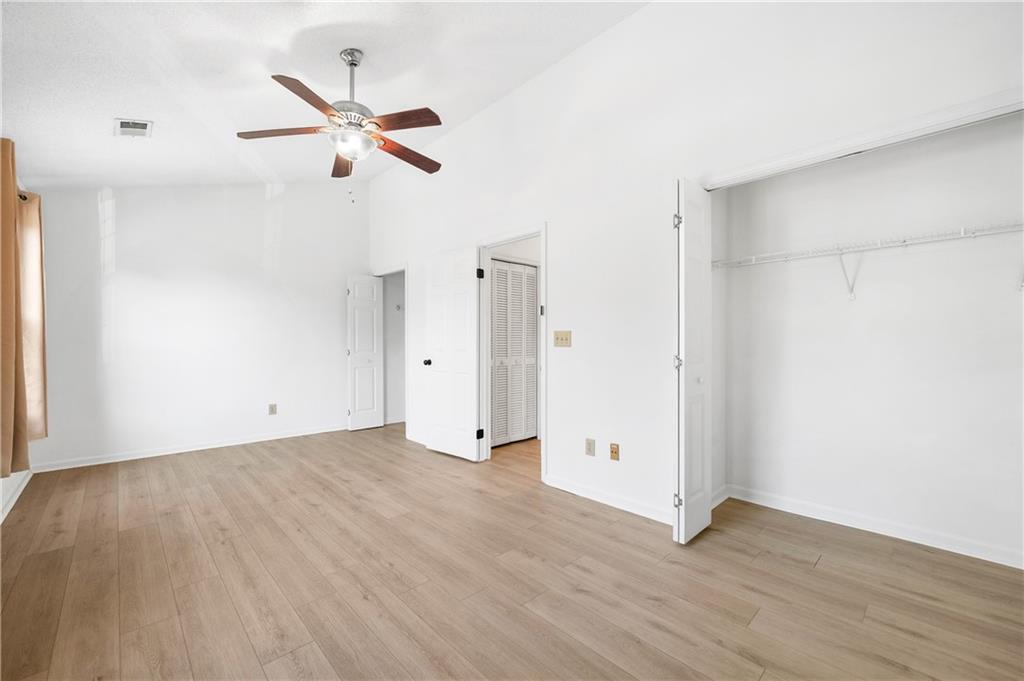 2883 Dresden Square Drive Atlanta, GA 30341 - Photo 15 of 30 a view of an empty room with wooden floor