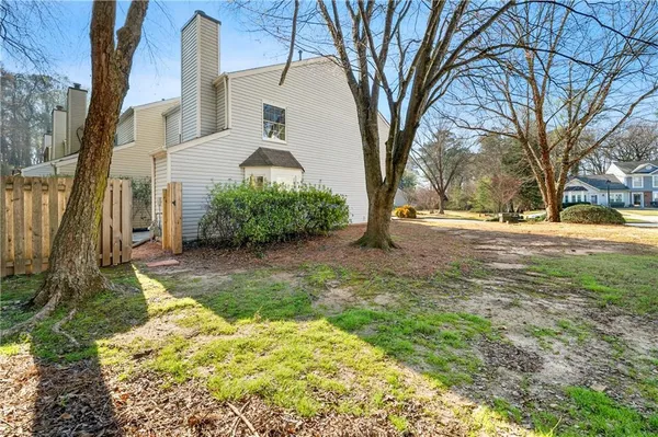 an aerial view of residential building with parking space