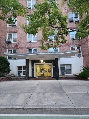 front view of a building with a road