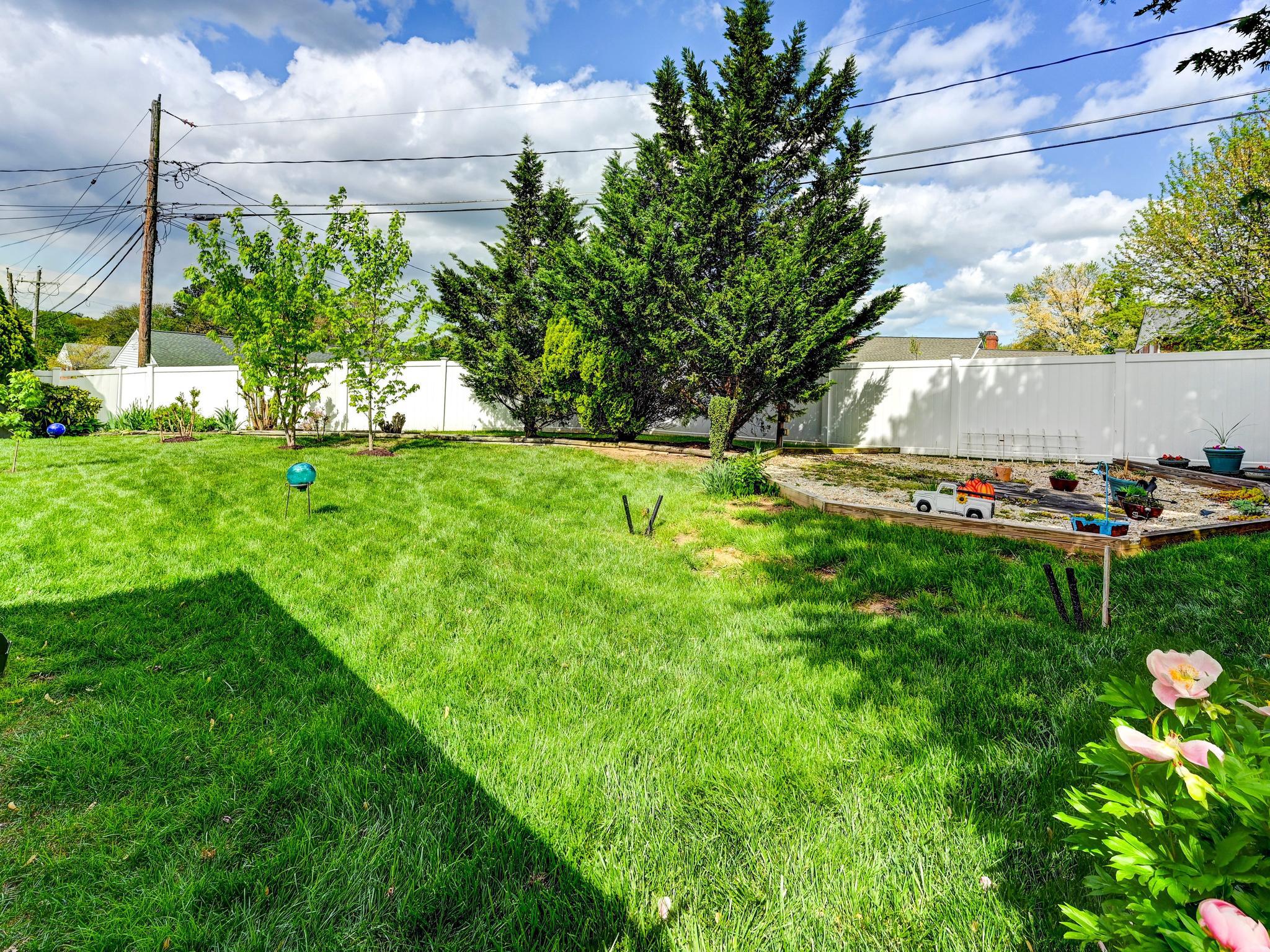 8416 Avery Road Rosedale, MD 21237 - Photo 30 of 35 Fully Fenced Back Yard - Previous Pool Area