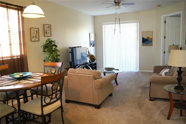 a living room with furniture and a window