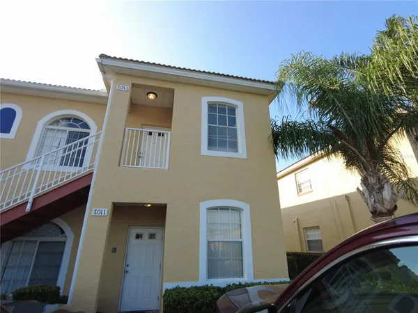 a front view of a house with balcony