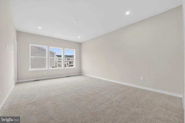 a bathroom with a double vanity sink and mirror