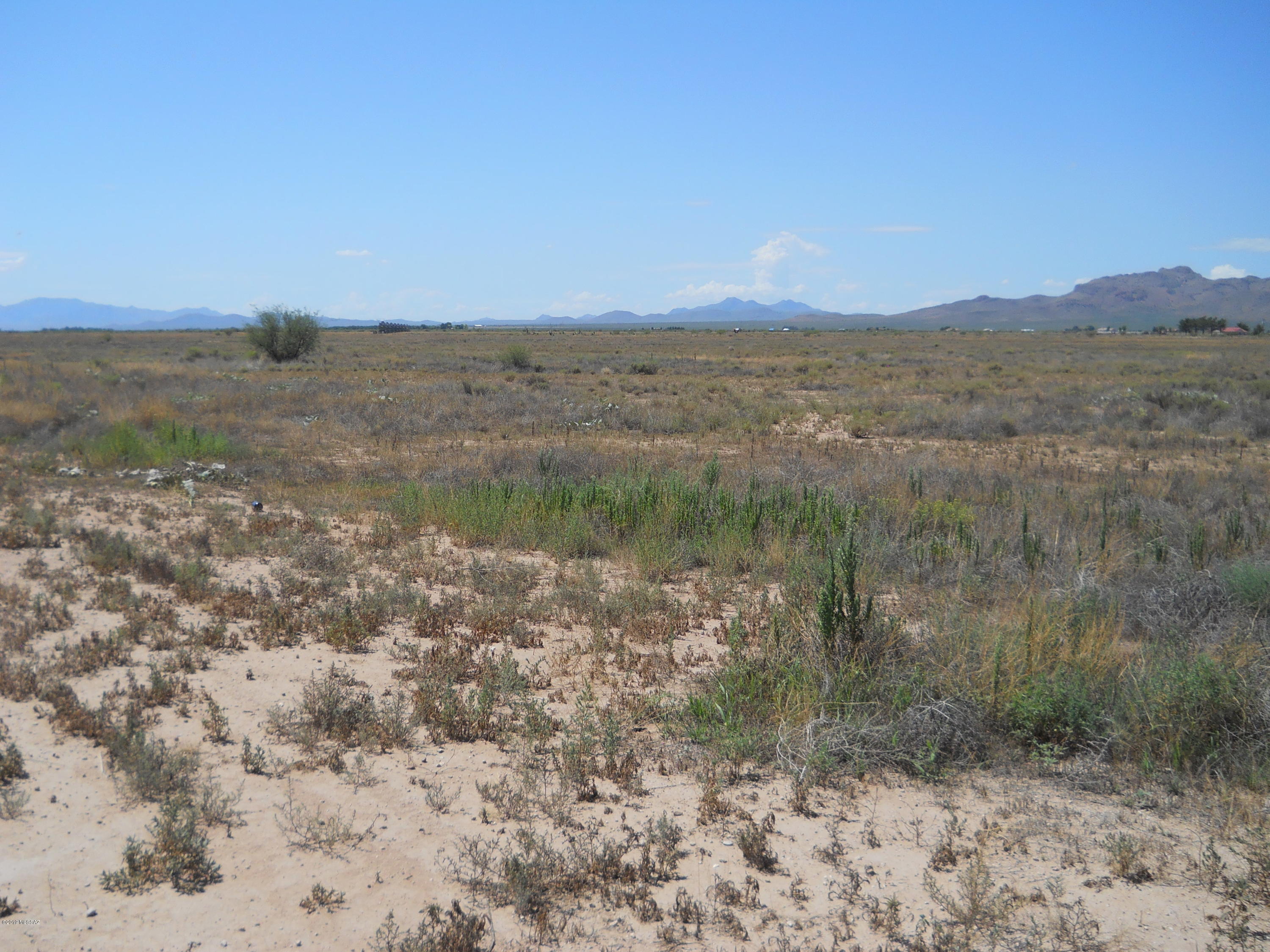 4301 Dearing Road Willcox, AZ 85643 - Photo 9 of 9 a view of a lake with mountains in the background
