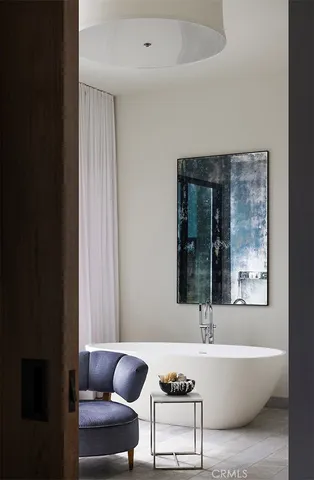 a living room with furniture and window