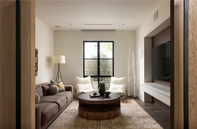 a bathroom with a bathtub and mirror