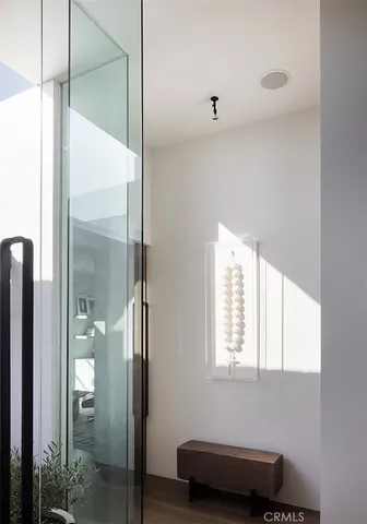 a room with furniture or wooden floor and windows