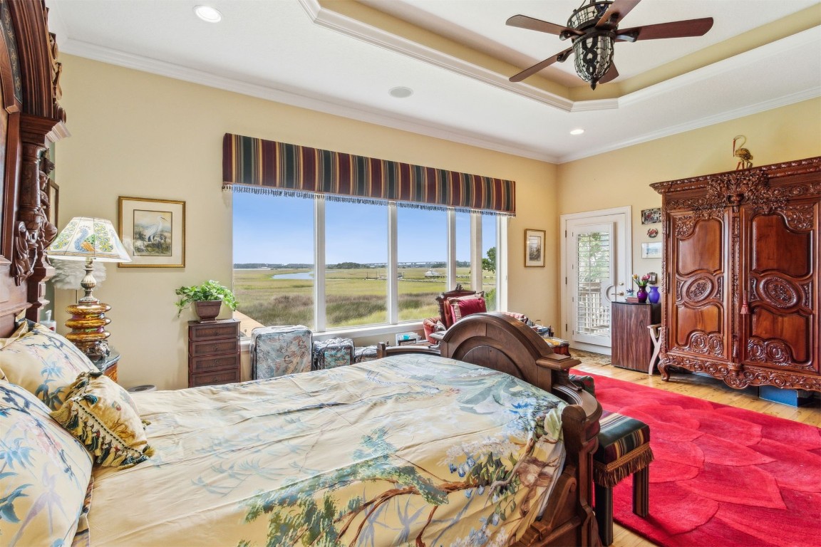 3045 Riverside Drive Fernandina Beach, FL 32034 - Photo 13 of 35 a bedroom with a bed and a large window