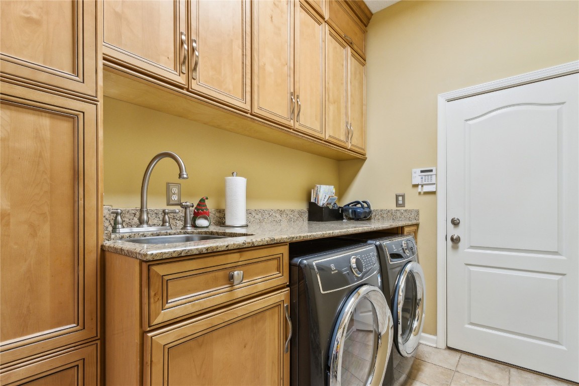 3045 Riverside Drive Fernandina Beach, FL 32034 - Photo 22 of 35 a view of a storage and utility room with washer and dryer