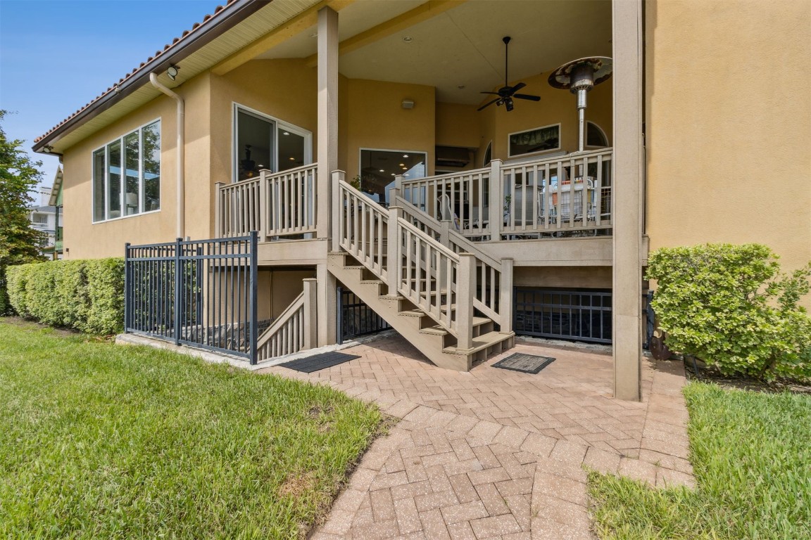 3045 Riverside Drive Fernandina Beach, FL 32034 - Photo 26 of 35 a view of house with a porch and furniture