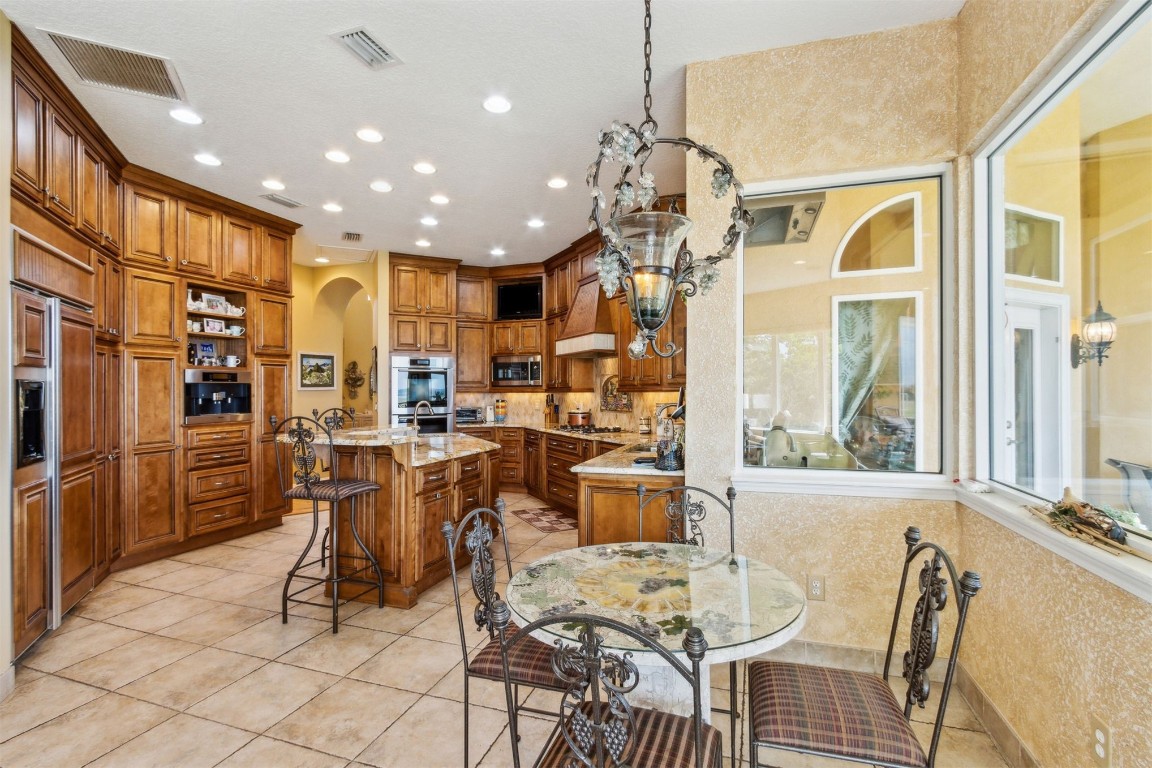 3045 Riverside Drive Fernandina Beach, FL 32034 - Photo 7 of 35 a view of a dining room with furniture window and wooden floor