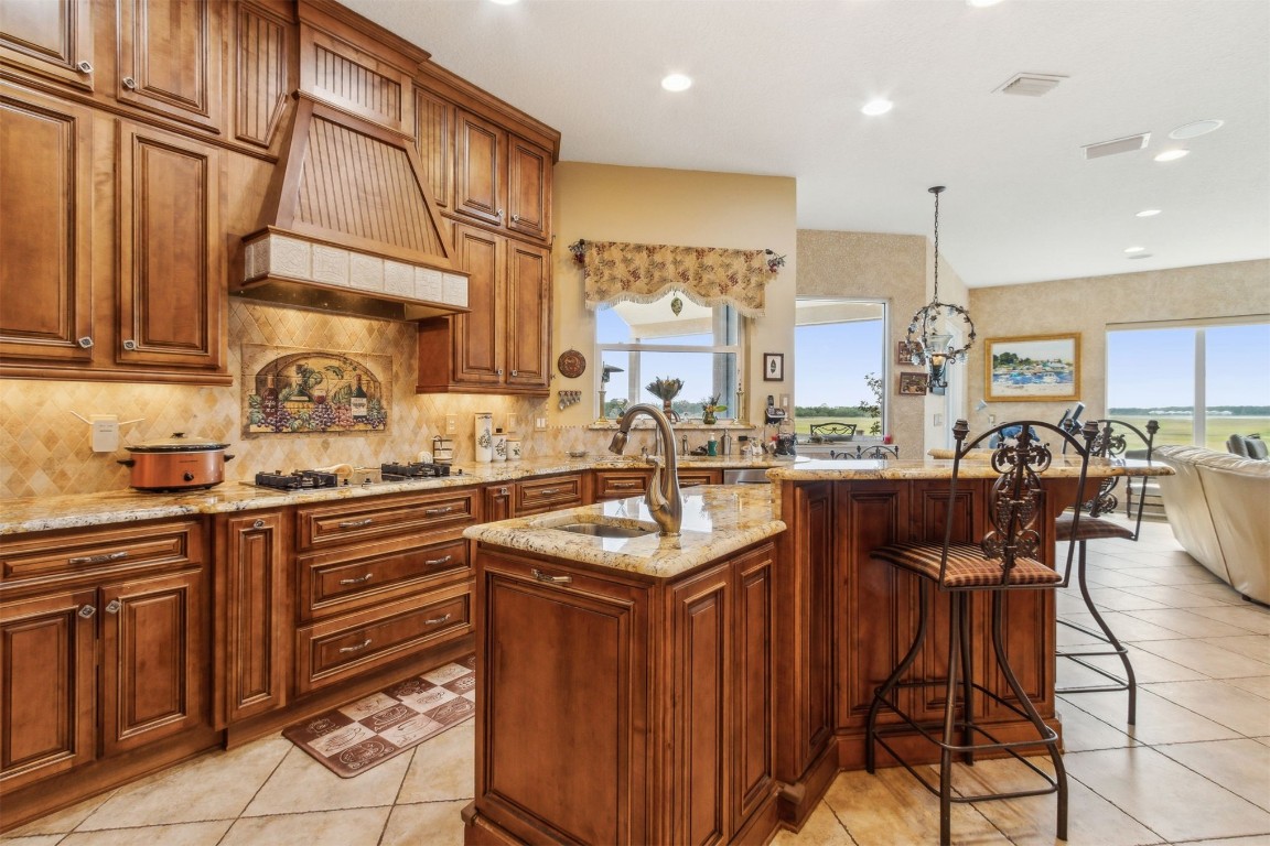 3045 Riverside Drive Fernandina Beach, FL 32034 - Photo 8 of 35 a kitchen with granite countertop lots of counter top space
