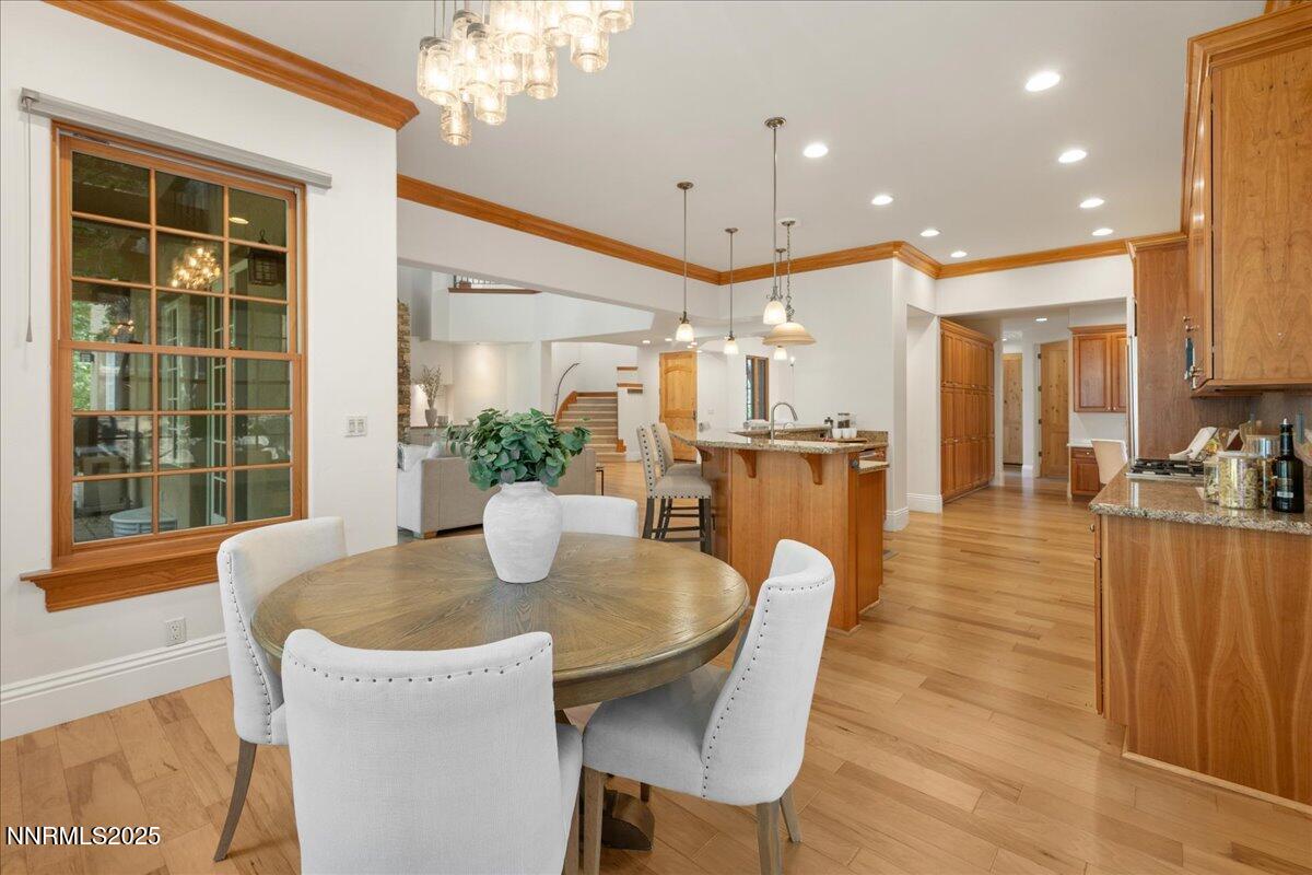 6410 Zermatt Court Reno, NV 89511 - Photo 18 of 52 a dining room with furniture and a large window