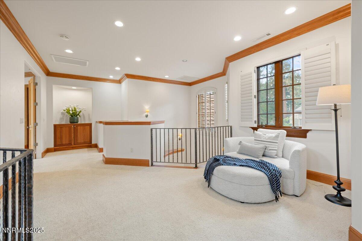 6410 Zermatt Court Reno, NV 89511 - Photo 27 of 52 a view of a livingroom with furniture and floor to ceiling window