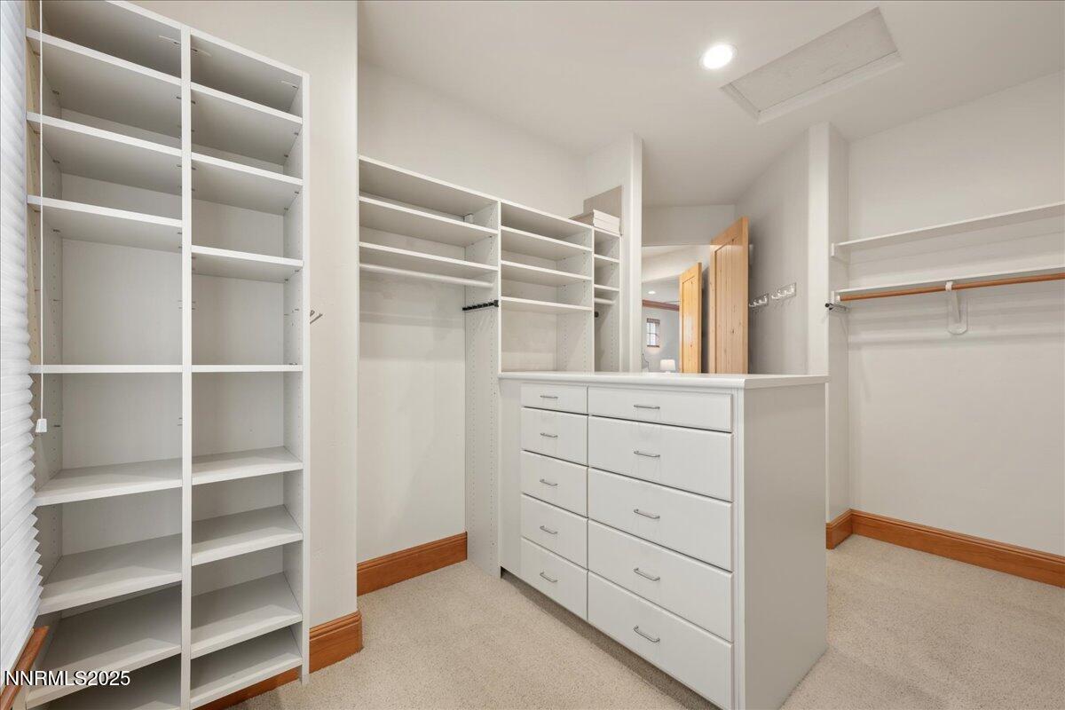 6410 Zermatt Court Reno, NV 89511 - Photo 34 of 52 a view of walk in closet with empty racks