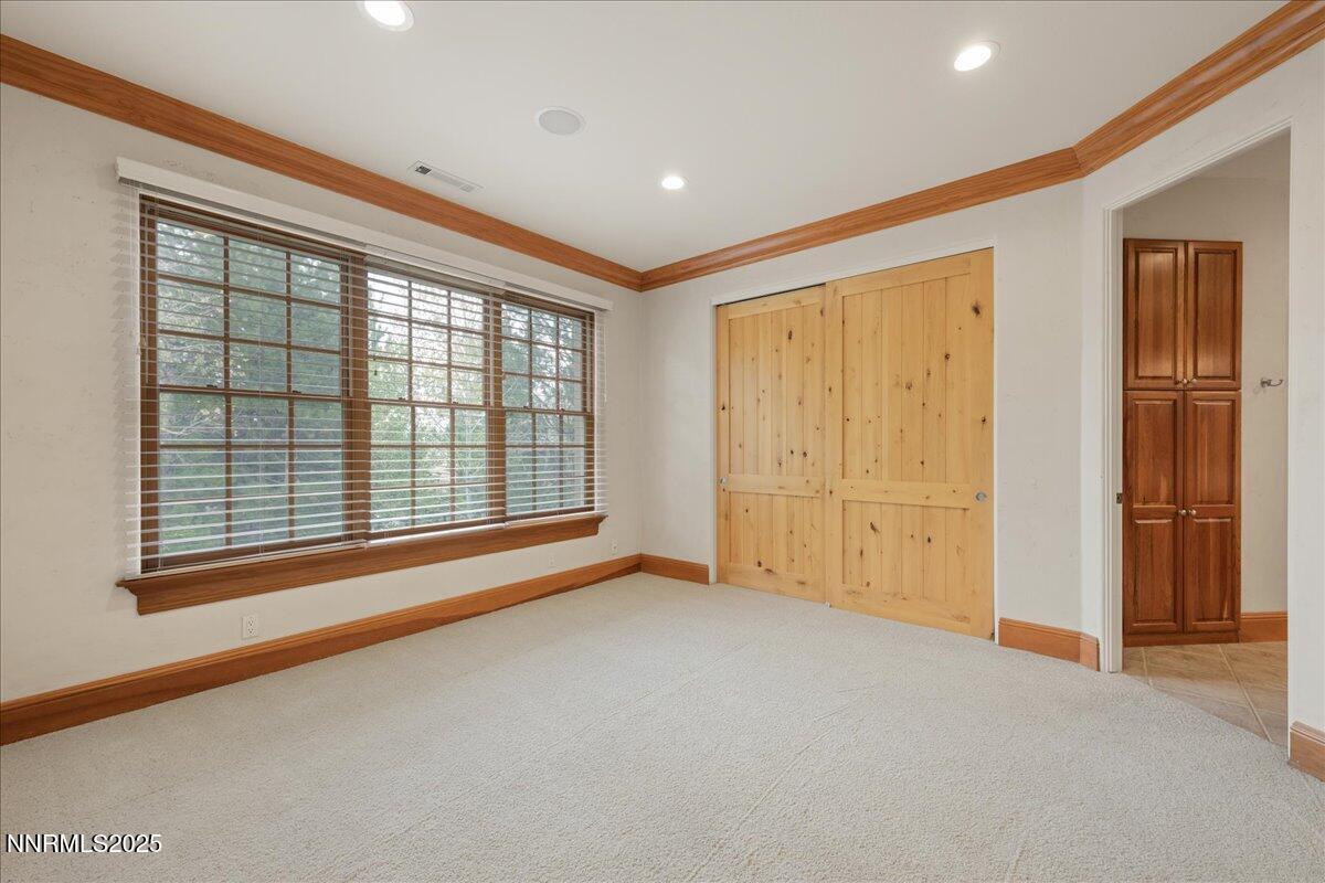 6410 Zermatt Court Reno, NV 89511 - Photo 41 of 52 a view of an empty room with a window