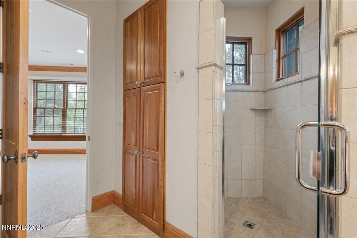 6410 Zermatt Court Reno, NV 89511 - Photo 44 of 52 a bathroom with a shower