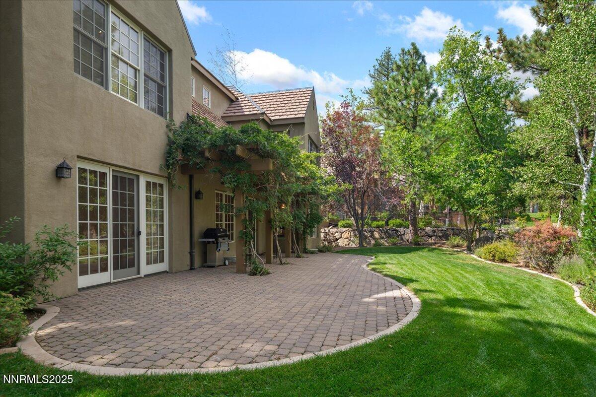 6410 Zermatt Court Reno, NV 89511 - Photo 45 of 52 a view of a house with backyard and garden