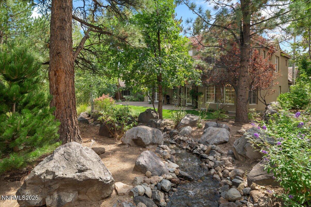 6410 Zermatt Court Reno, NV 89511 - Photo 50 of 52 a view of a garden with plants and trees