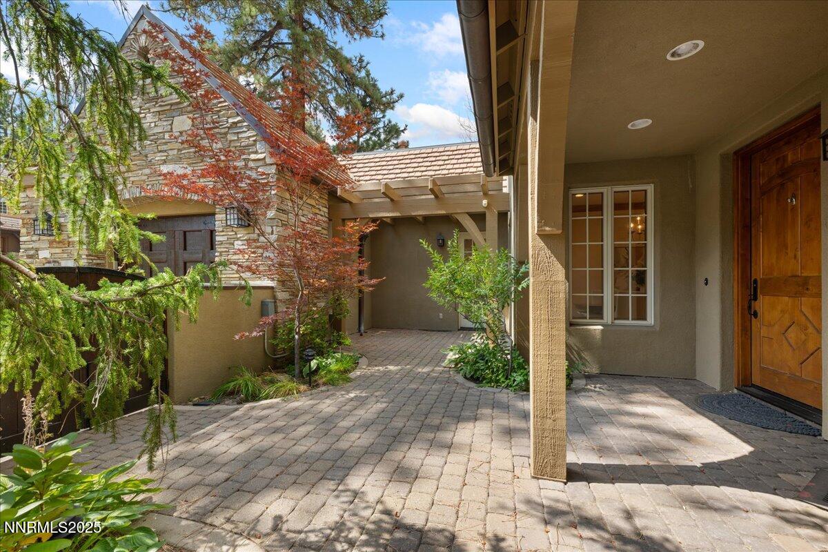 6410 Zermatt Court Reno, NV 89511 - Photo 5 of 52 a front view of a house with garden