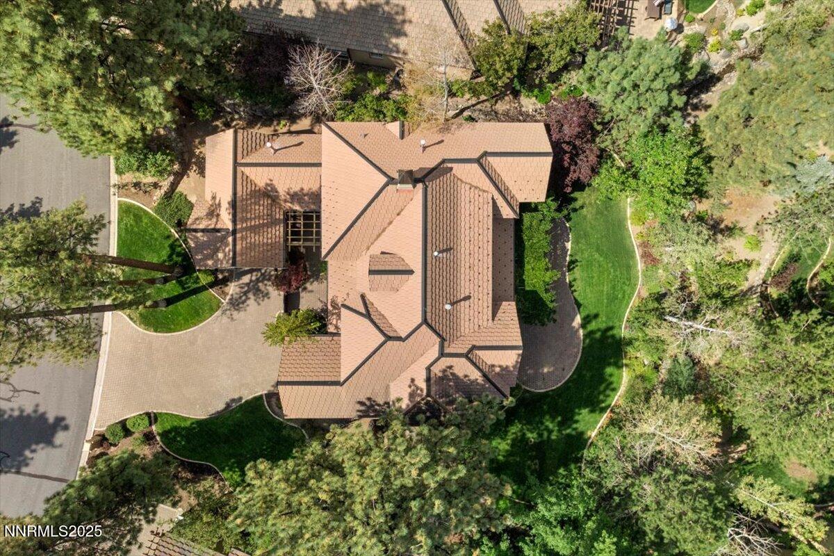 6410 Zermatt Court Reno, NV 89511 - Photo 52 of 52 an aerial view of a tennis ground and large trees