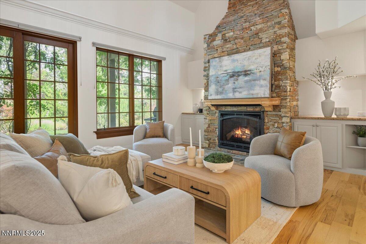 6410 Zermatt Court Reno, NV 89511 - Photo 7 of 52 a living room with furniture large window and fireplace