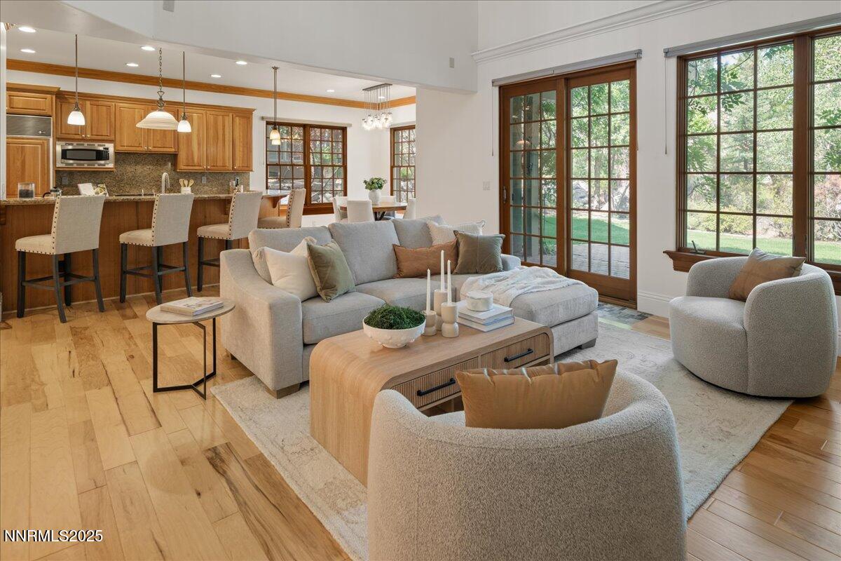 6410 Zermatt Court Reno, NV 89511 - Photo 10 of 52 a living room with furniture and a large window