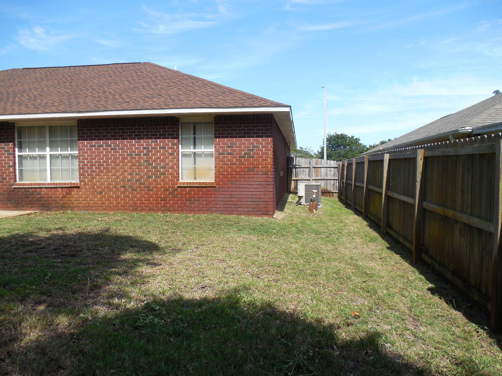 2095 Jessica Way Navarre, FL 32566 - Photo 11 of 52 Side Yard (2)