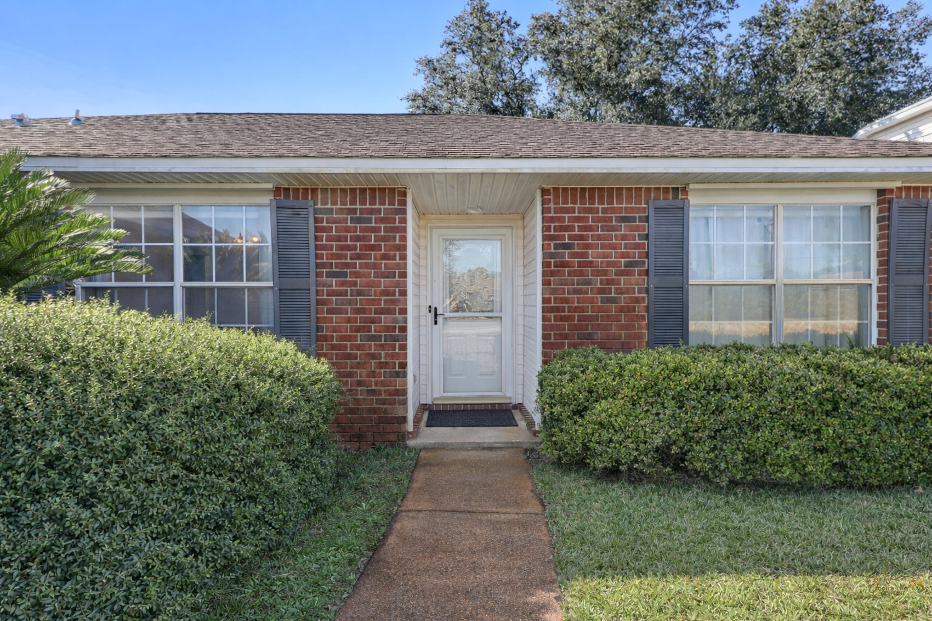 2095 Jessica Way Navarre, FL 32566 - Photo 14 of 52 front view of a house with a yard