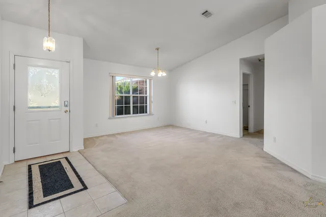 a white toilet sitting next to a shower