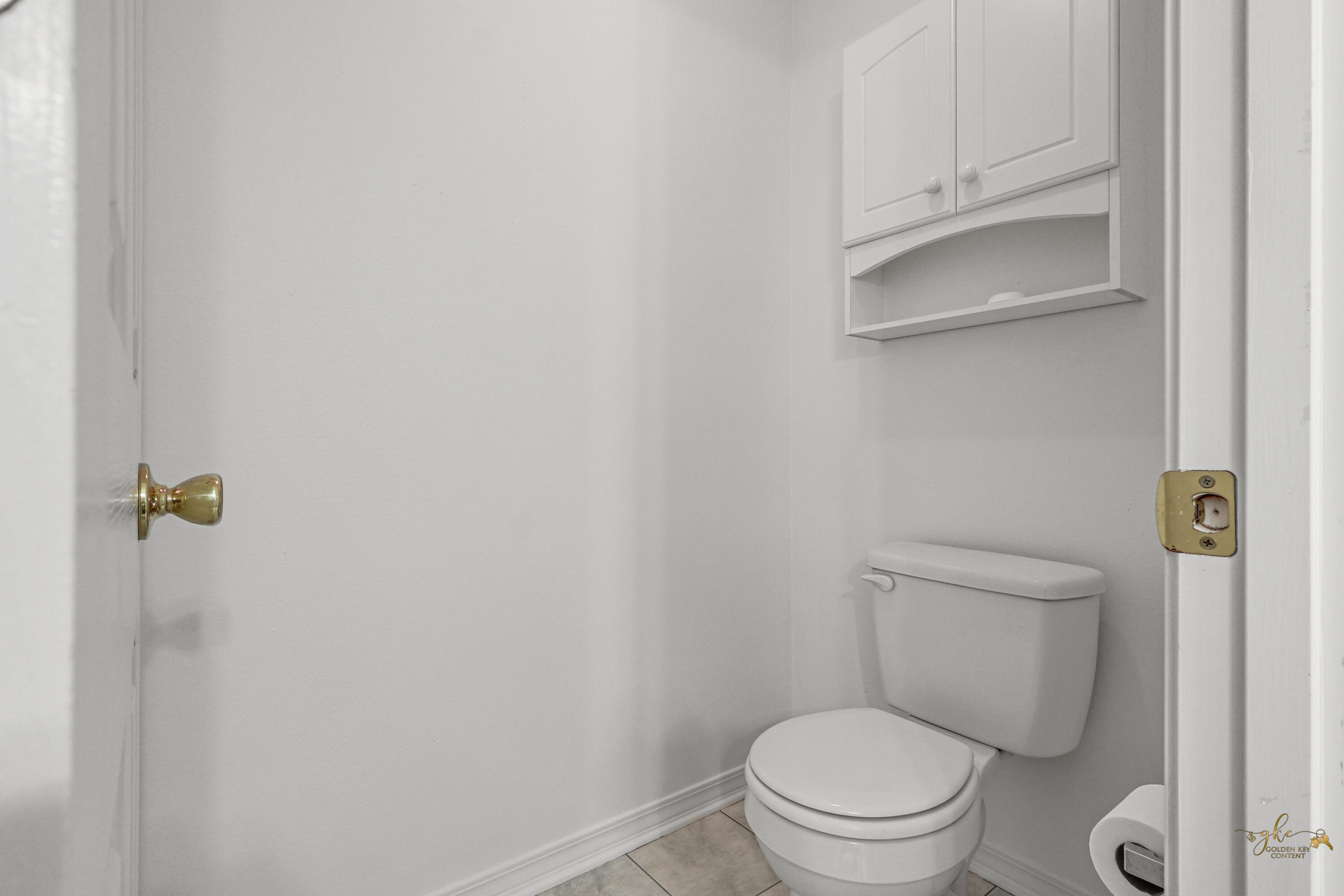 2095 Jessica Way Navarre, FL 32566 - Photo 34 of 52 a white toilet sitting next to a shower