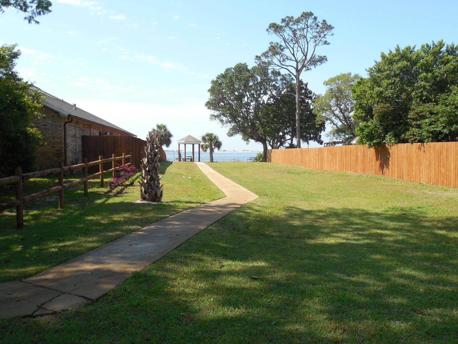 2095 Jessica Way Navarre, FL 32566 - Photo 45 of 52 a view of a park with large trees