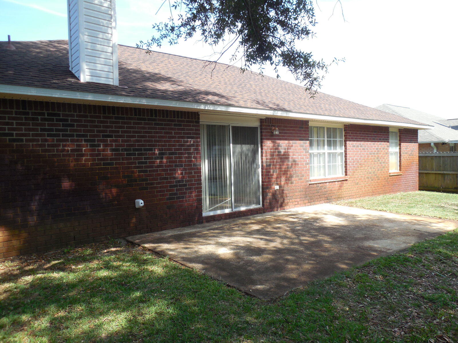 2095 Jessica Way Navarre, FL 32566 - Photo 6 of 52 a front view of a house with a yard and garage