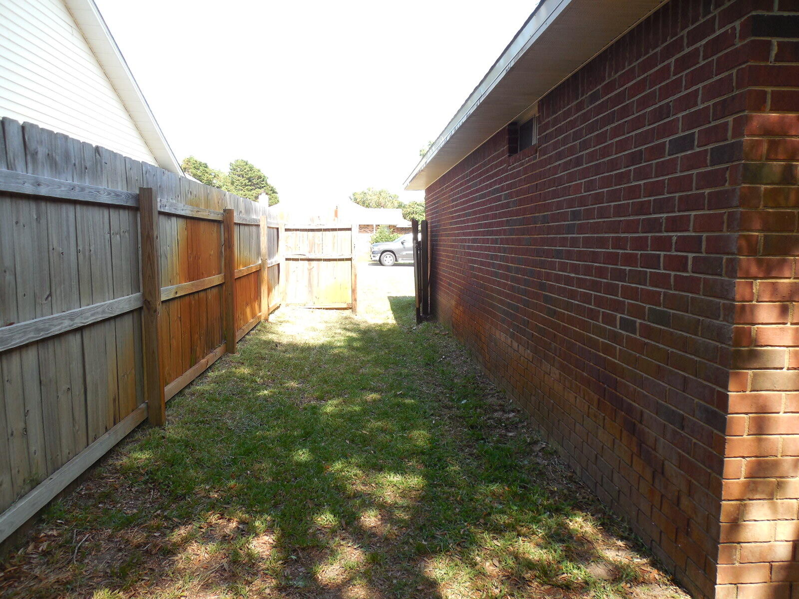 2095 Jessica Way Navarre, FL 32566 - Photo 7 of 52 Side Yard (1)