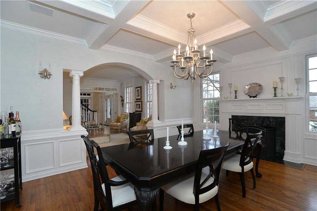 32 Newgate Road Pittsburgh, PA 15202 - Photo 8 of 25 A coffered ceiling adds charm to this formal dining room with a fireplace.