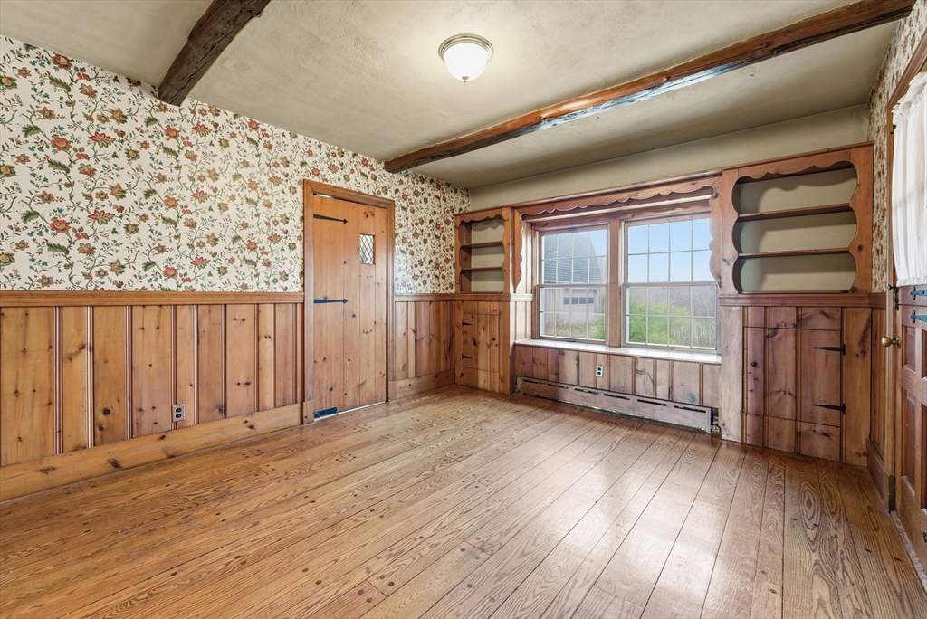 171 Maple Street East Longmeadow, MA 01028 - Photo 16 of 42 en empty room with windows and wooden floor