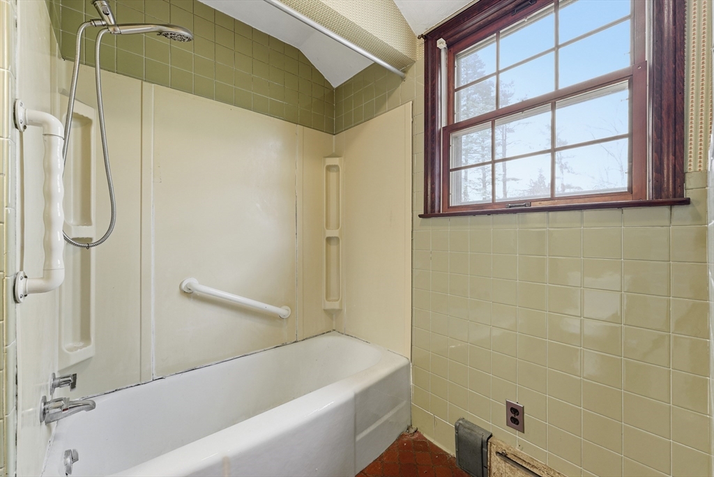 171 Maple Street East Longmeadow, MA 01028 - Photo 21 of 42 a bathroom with a bathtub and a shower