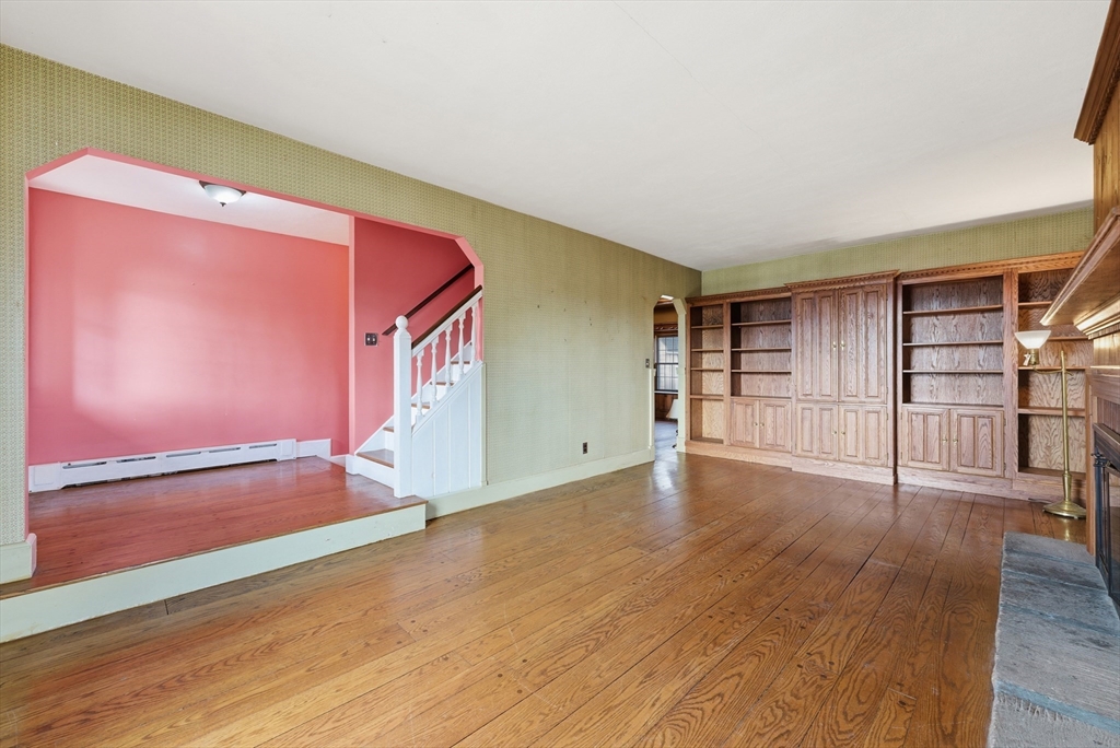 171 Maple Street East Longmeadow, MA 01028 - Photo 24 of 42 a view of an empty room with wooden floor and a window
