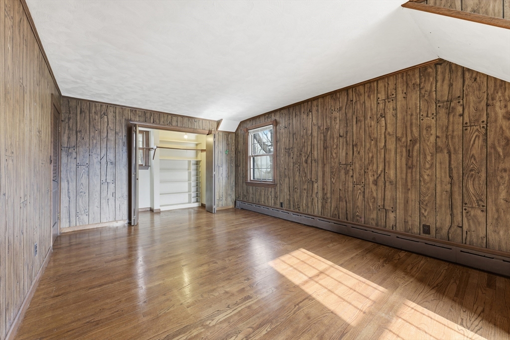 171 Maple Street East Longmeadow, MA 01028 - Photo 28 of 42 a view of an empty room with wooden floor and entryway