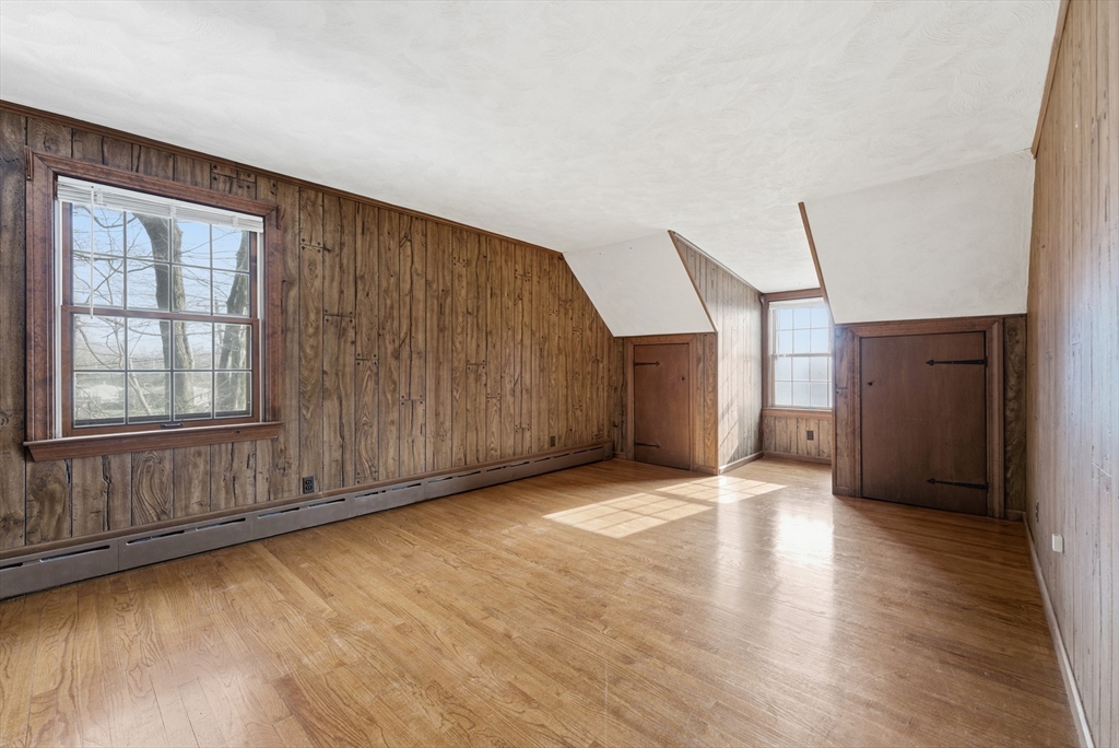 171 Maple Street East Longmeadow, MA 01028 - Photo 29 of 42 a view of an empty room with wooden floor and a window