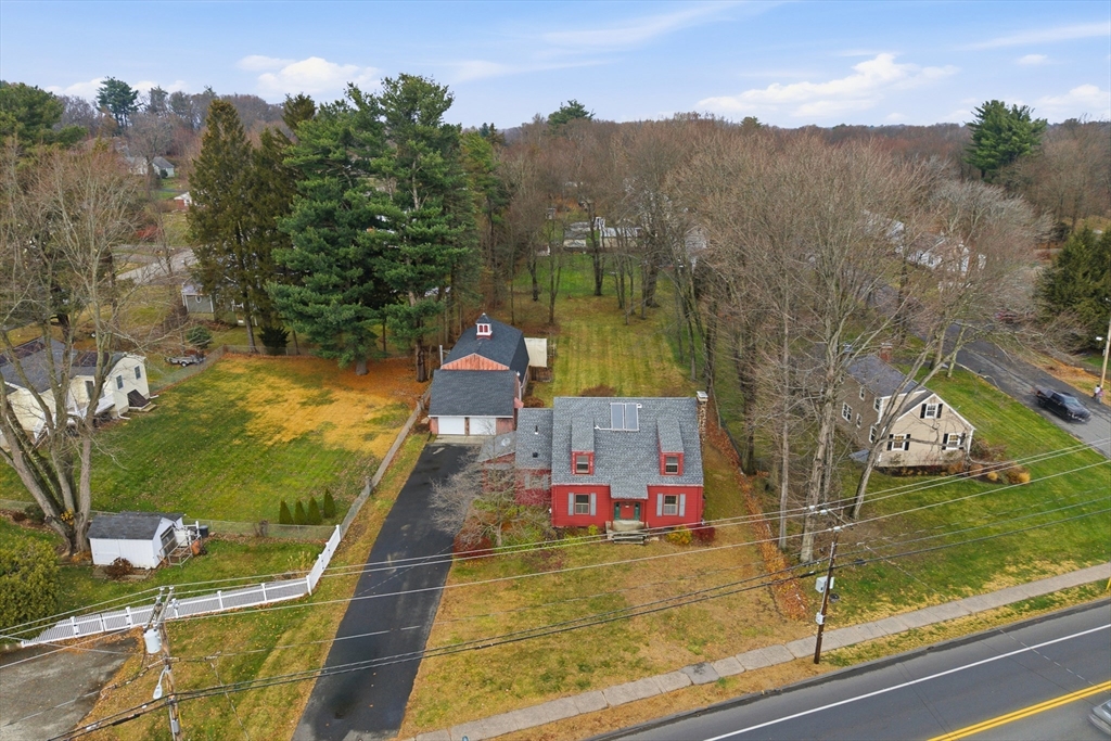 171 Maple Street East Longmeadow, MA 01028 - Photo 6 of 42 a view of a balcony with two chairs and a table