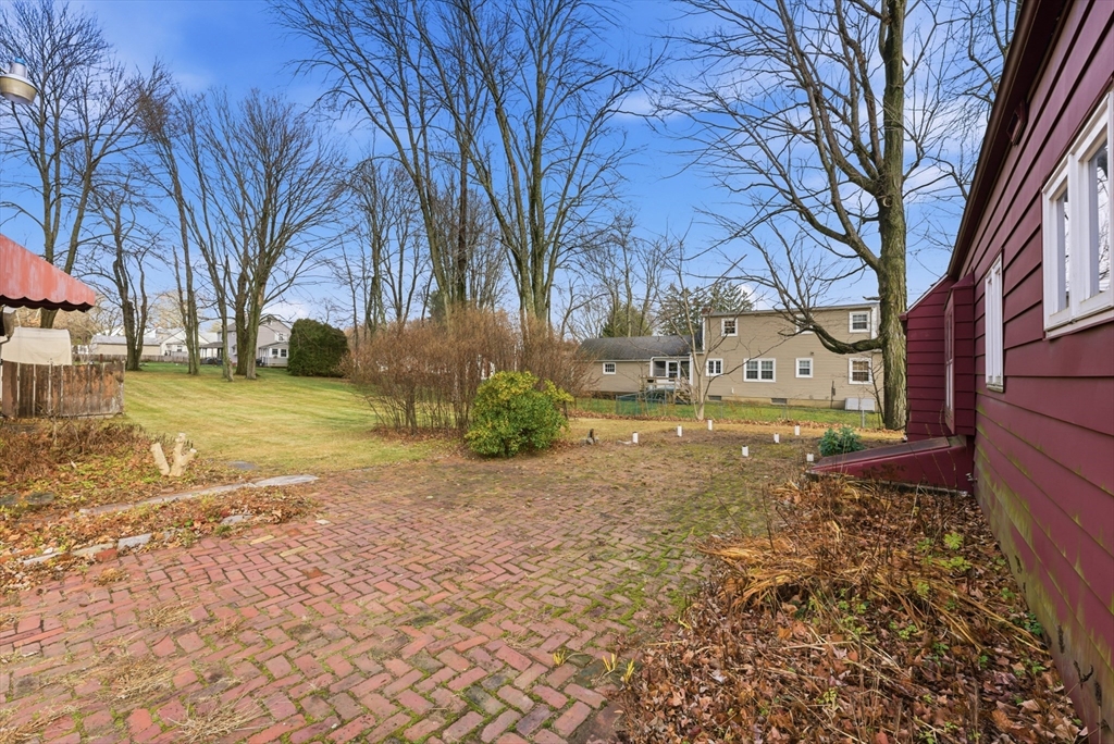 171 Maple Street East Longmeadow, MA 01028 - Photo 10 of 42 a backyard of a house with lots of green space