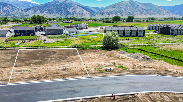 3248 South 1125th West, Unit 22 Logan, UT 84321 - Photo 3 of 20 Graded building lot with mountain scenery
