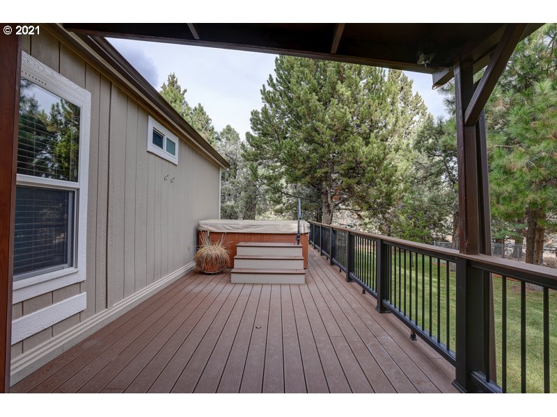 67367 Gist Road Bend, OR 97703 - Photo 17 of 32 a view of balcony with wooden floor and outdoor space