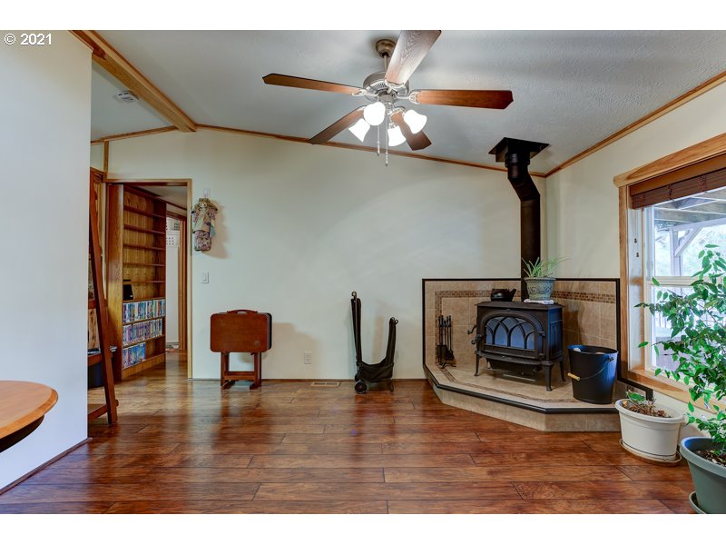 67367 Gist Road Bend, OR 97703 - Photo 3 of 32 a living room with furniture and a fireplace