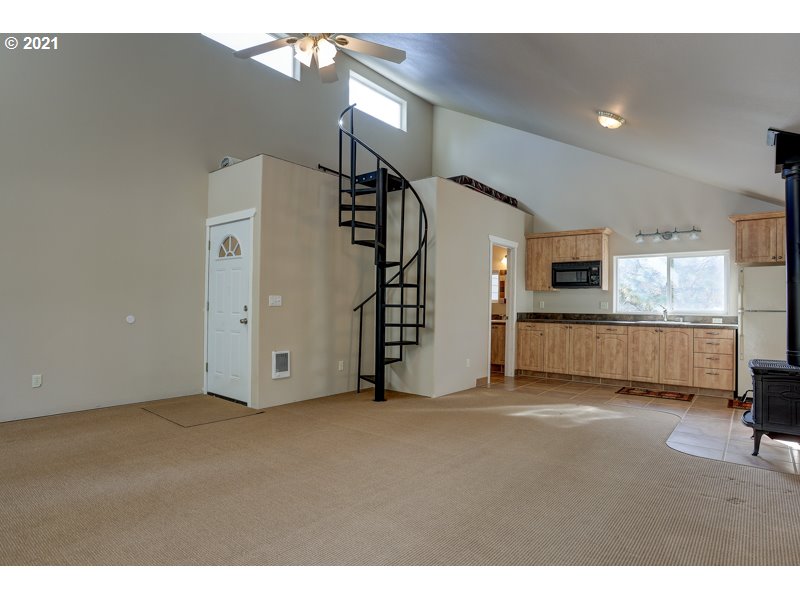 67367 Gist Road Bend, OR 97703 - Photo 22 of 32 a view of an empty room with a window