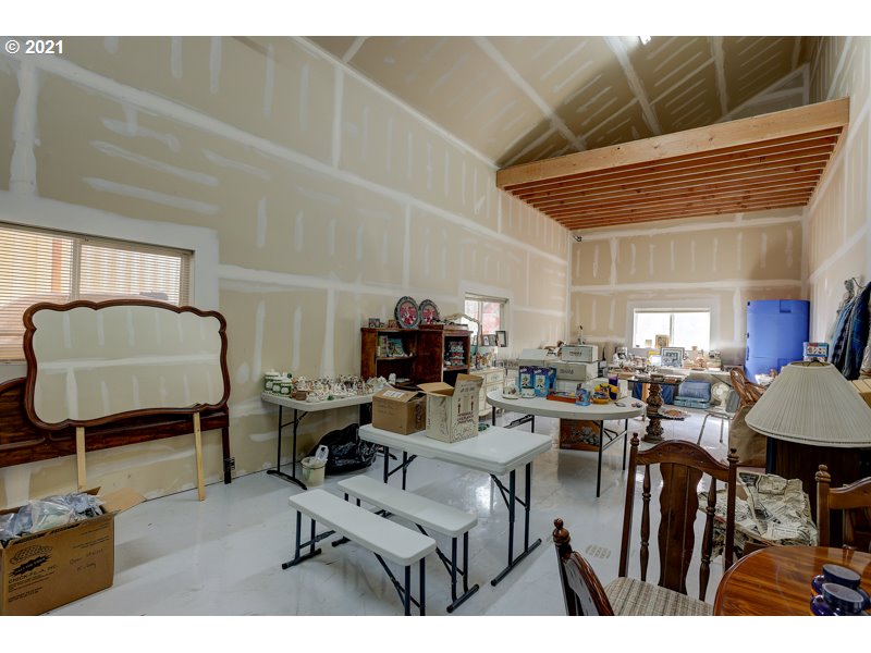 67367 Gist Road Bend, OR 97703 - Photo 26 of 32 a living room with lots of furniture and a lamp