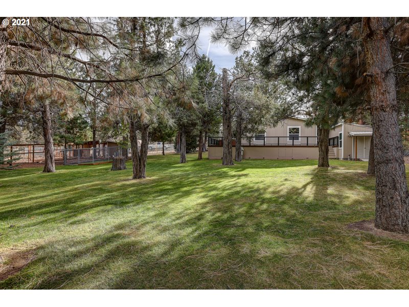67367 Gist Road Bend, OR 97703 - Photo 29 of 32 a view of a house with a big yard