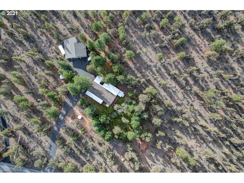 67367 Gist Road Bend, OR 97703 - Photo 31 of 32 a view of a house in a field